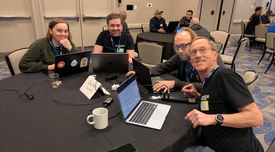 Randy at table doing first-time contributor mentoring.